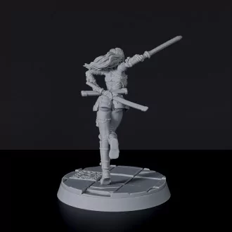 Fantasy miniature of female fighter Yuko with swords - Bloodfields tabletop RPG game