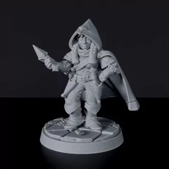 Miniature of thief - Dwarf Female Rogue with knives and cloak for fantasy tabletop role-playing games