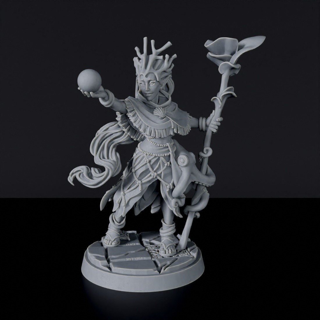 Miniature of Elf Female Druid with staff and sphere for fantasy tabletop role-playing games Elf Female Druid